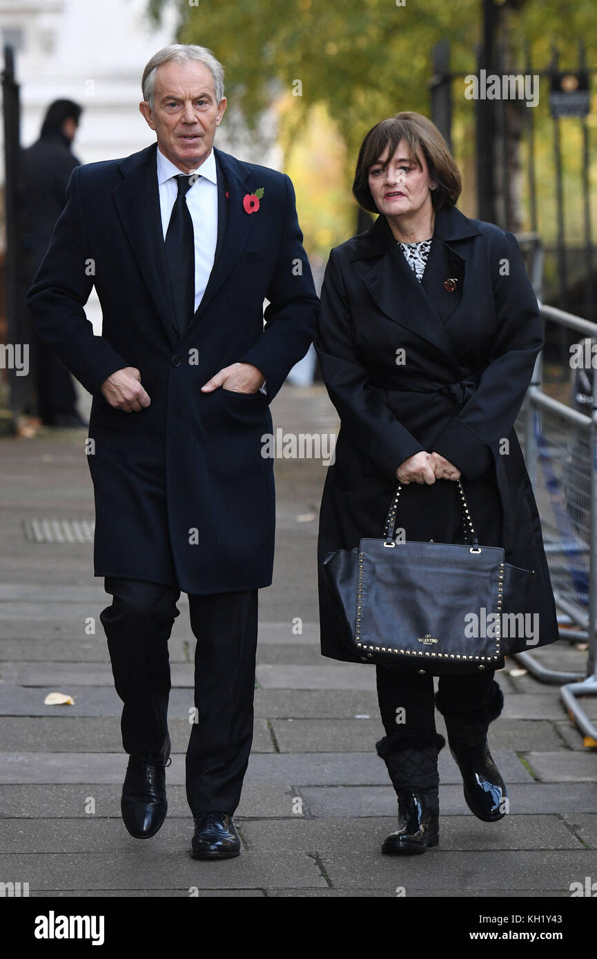 Former Prime Minister Tony Blair and his wife Cherie walk through Downing Street on their way to the annual Remembrance Sunday Service at the Cenotaph memorial in Whitehall, central London. Stock Photo