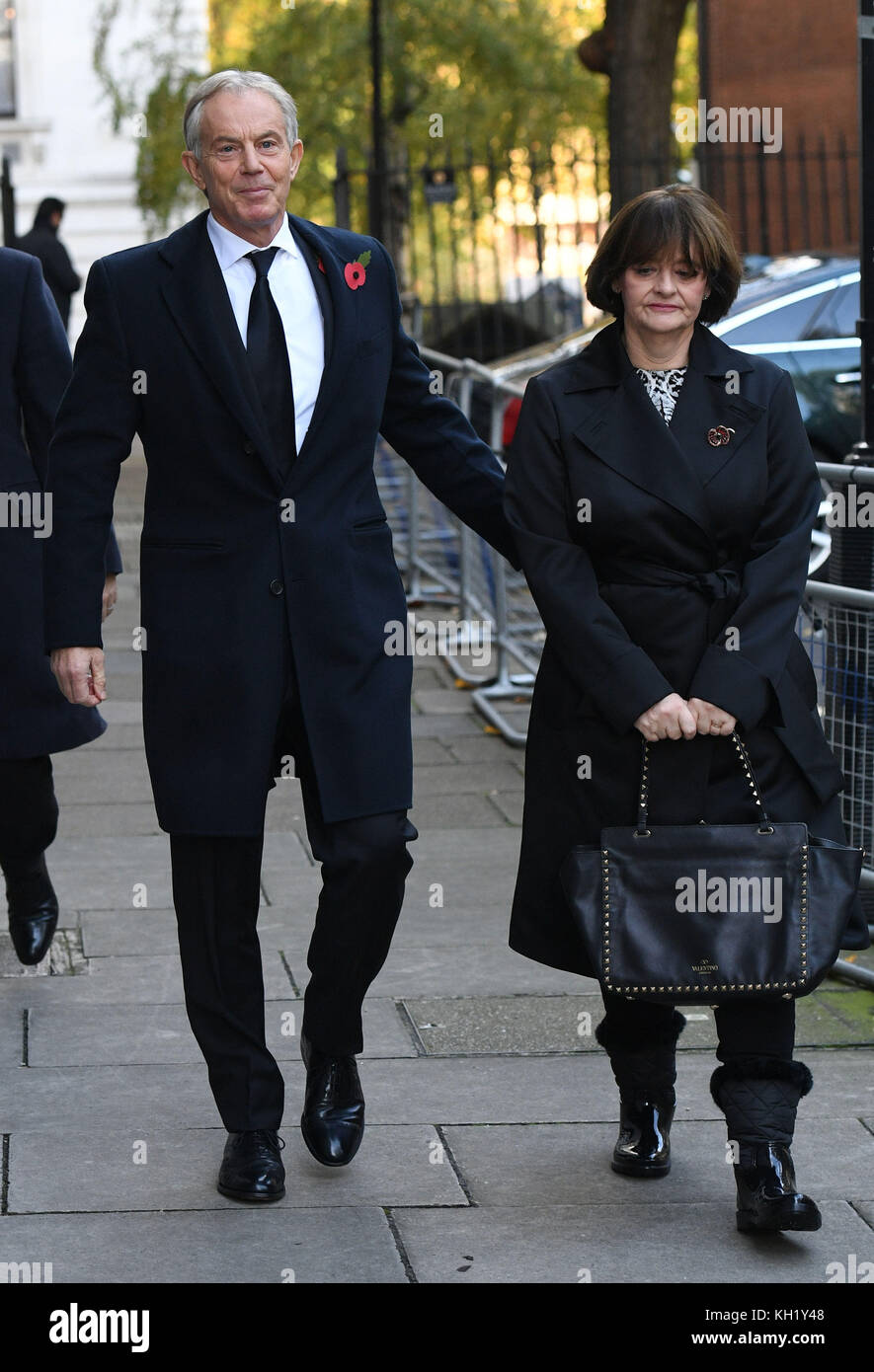 Former Prime Minister Tony Blair and his wife Cherie walk through Downing Street on their way to the annual Remembrance Sunday Service at the Cenotaph memorial in Whitehall, central London. Stock Photo