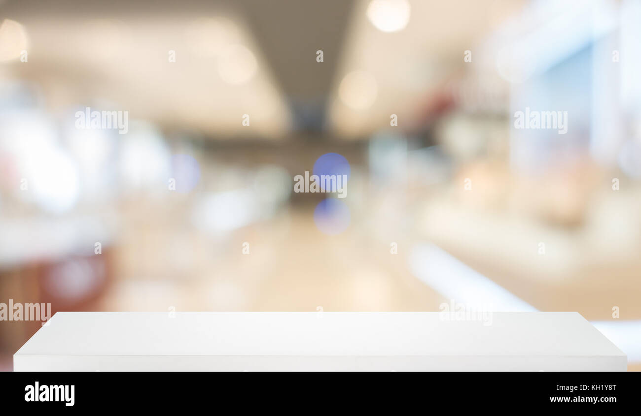 blurred, defocused convenience store with wooden shelf Stock Photo