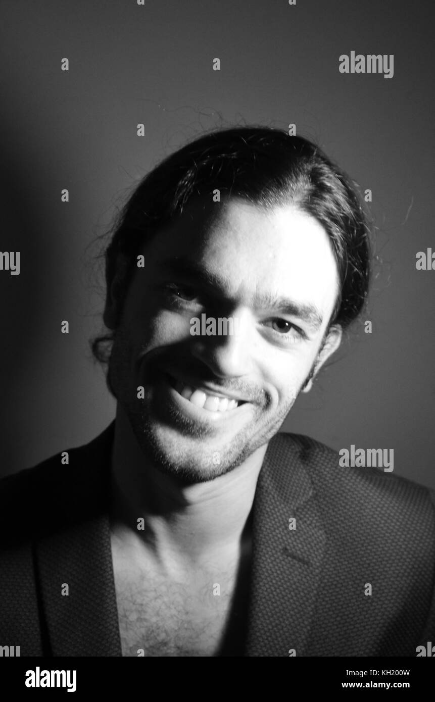 Black And White Half Naked Male Portrait With Jacked And Tied Hair 
