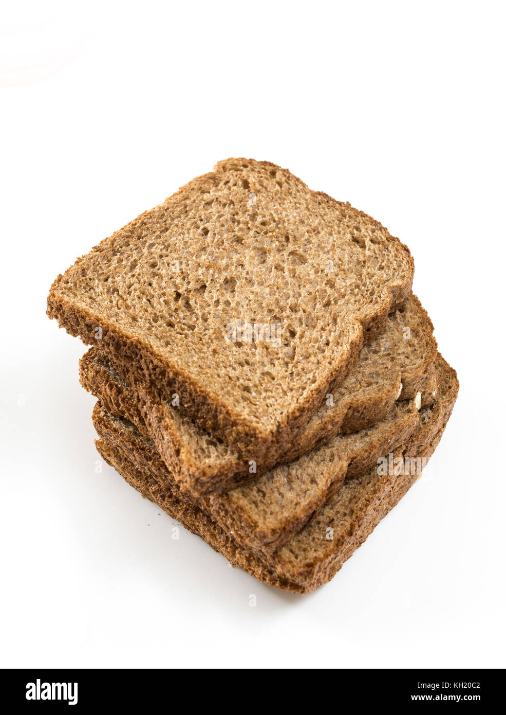 Whole grain sandwich bread slices, on white background Stock Photo Alamy
