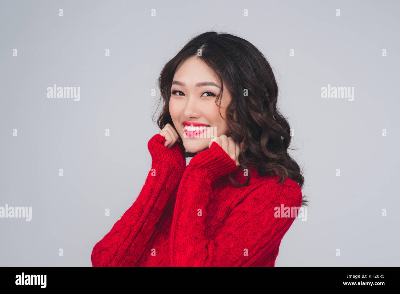 Portrait of a beautiful  young asian woman in warm clothes Stock Photo