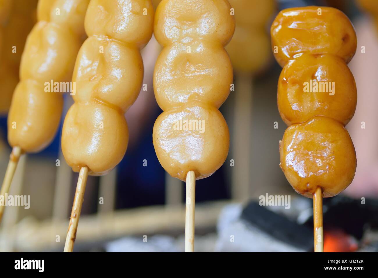 Japanese Street Food Dango (rice dumpling) sweet dish during traditional festival Stock Photo