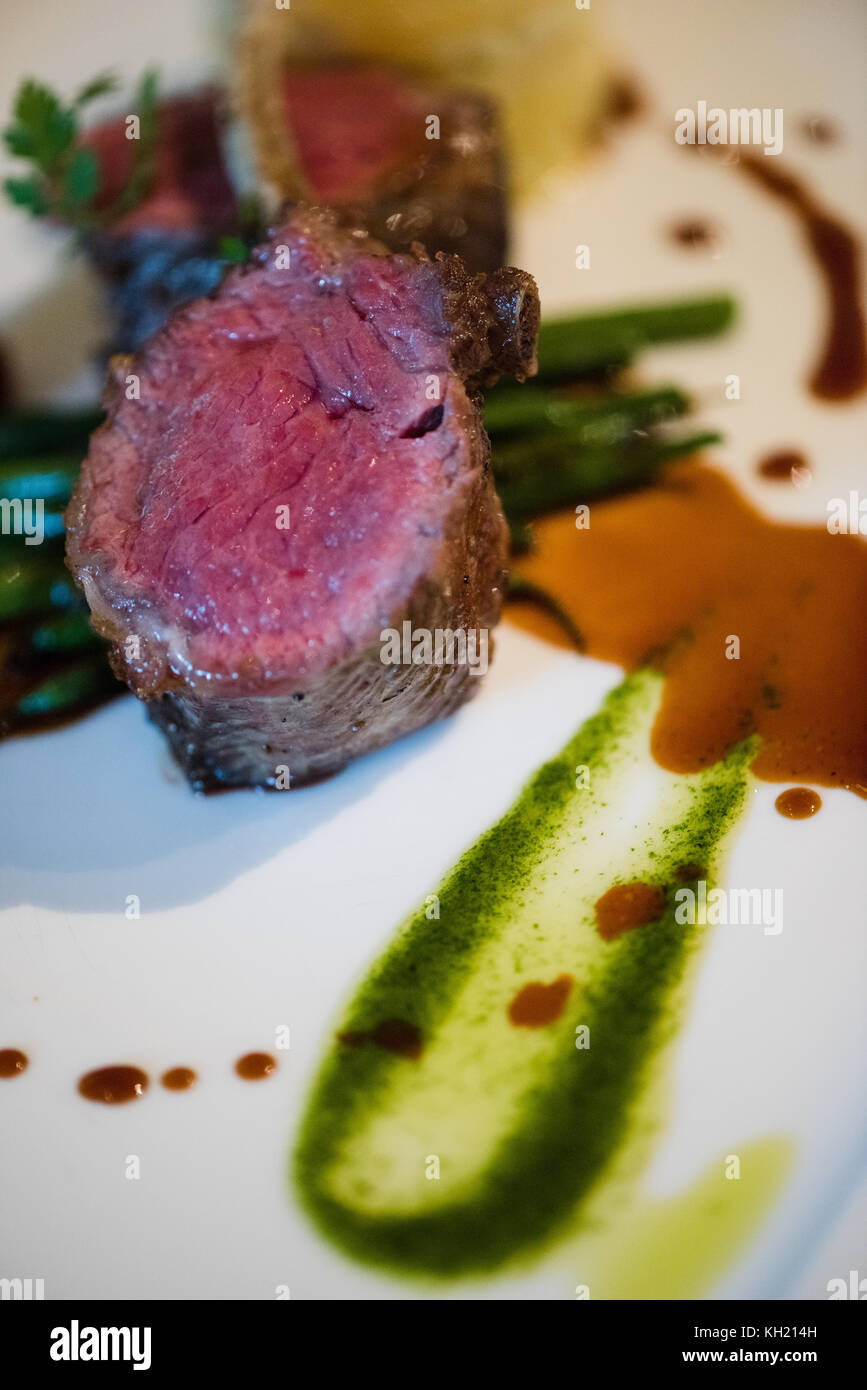 Close up of a rare cooked lamb chop dish Stock Photo Alamy