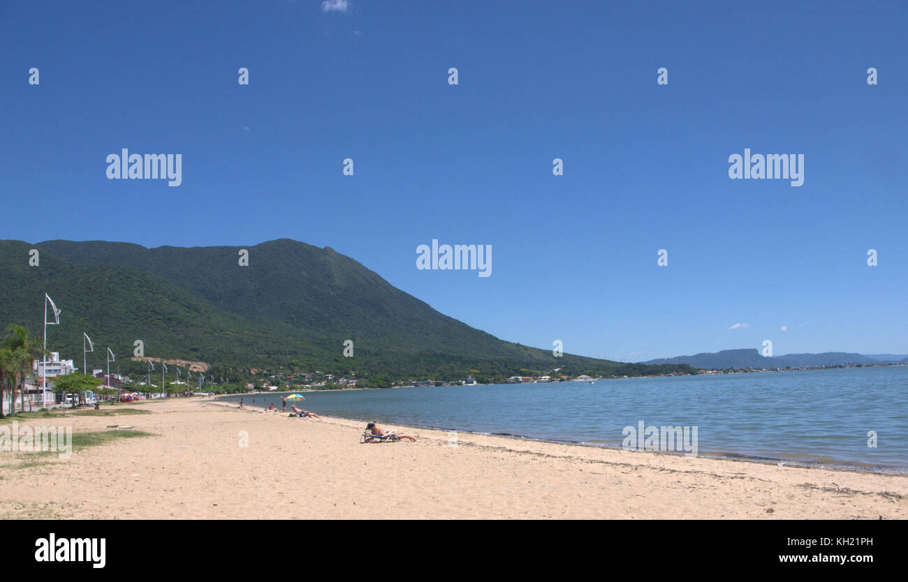 a relaxing day in the sun at the beach Stock Photo Alamy