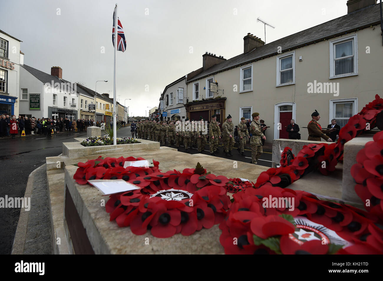 Soldiers march during events to remember the 12 victims of the IRA's 1987 Remembrance Sunday bomb attack in Enniskillen, Co Fermanagh. Stock Photo