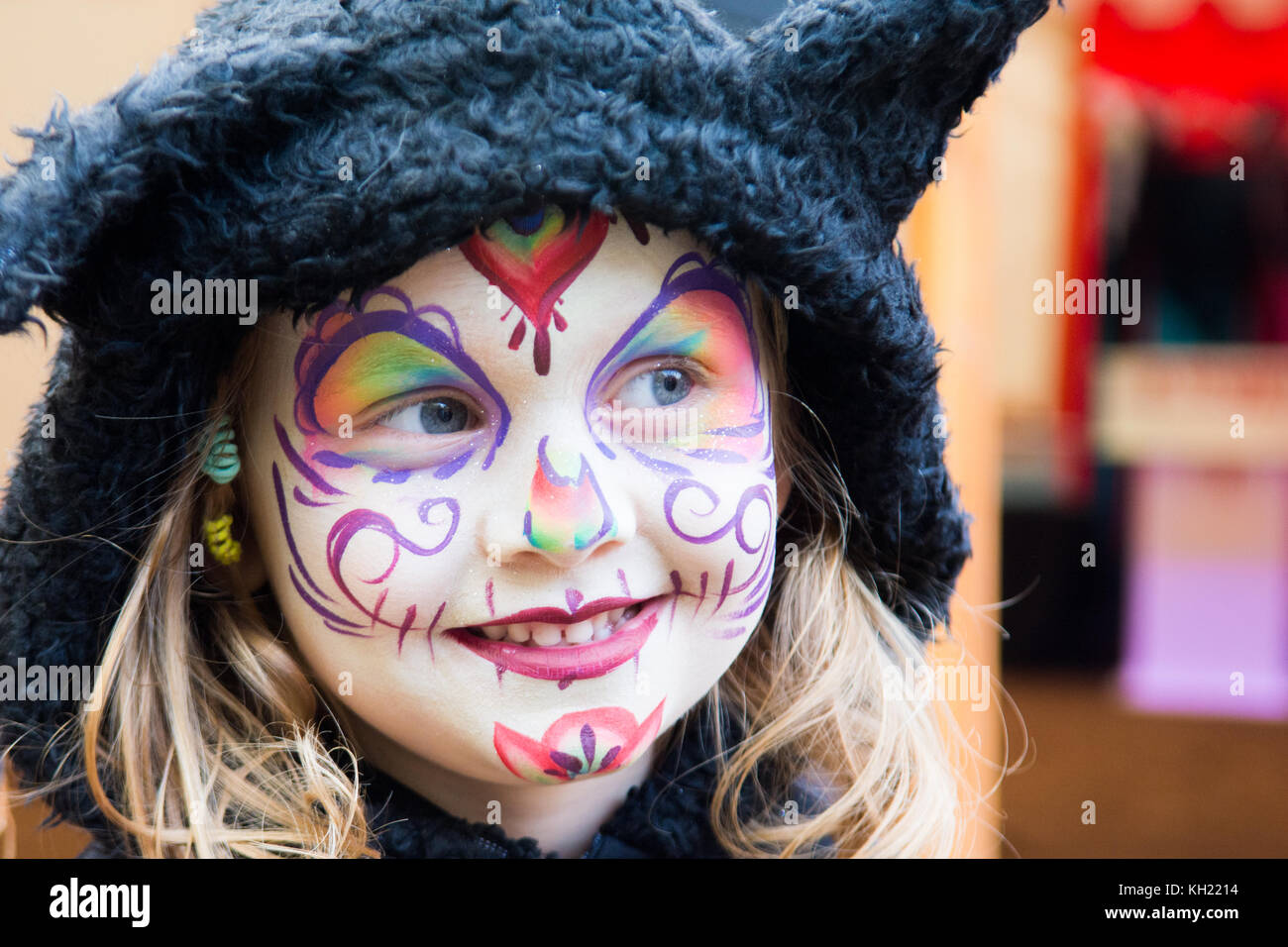 young woman with body painting on her face, ugly scary clown, Halloween  topic Stock Photo - Alamy