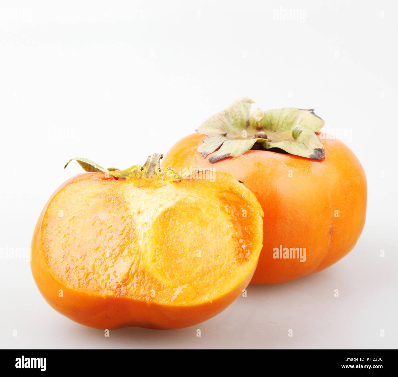 Fresh ripe persimmons Stock Photo - Alamy