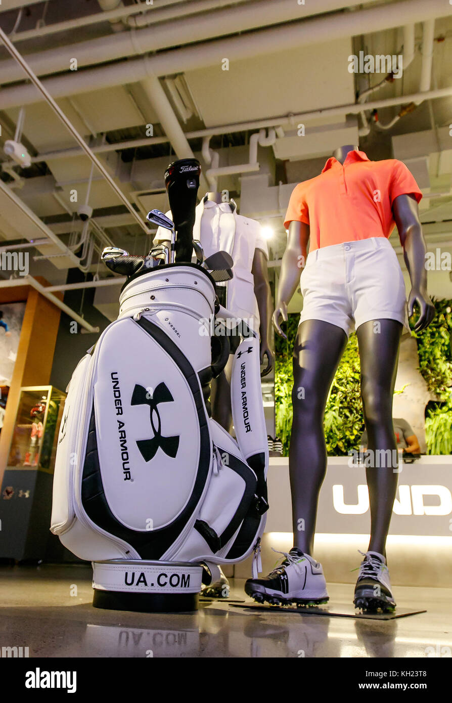 Golf bag and clubs next to headless mannequins wearing golf outfits in Under  Armour store inside Prudential Center in Boston Stock Photo - Alamy