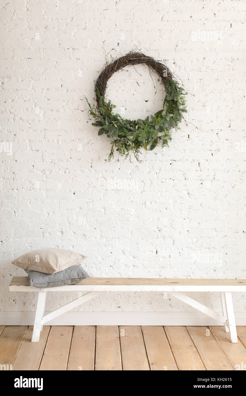 Wreath hanging over bench Stock Photo Alamy