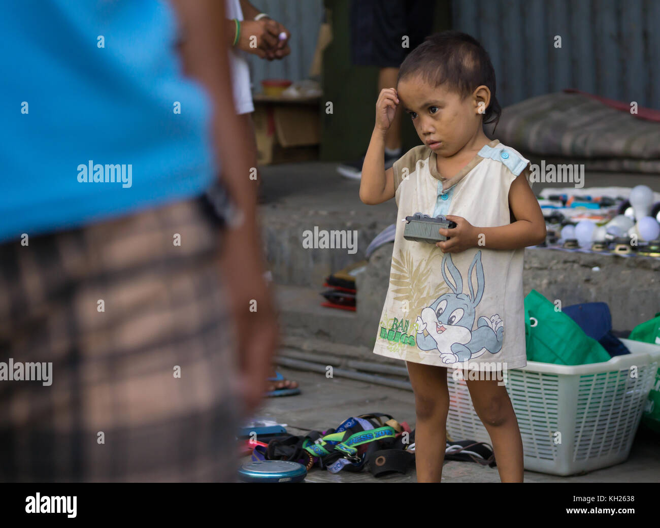 A Filipino street child within the downtown area of Cebu City,Philippines. Stock Photo