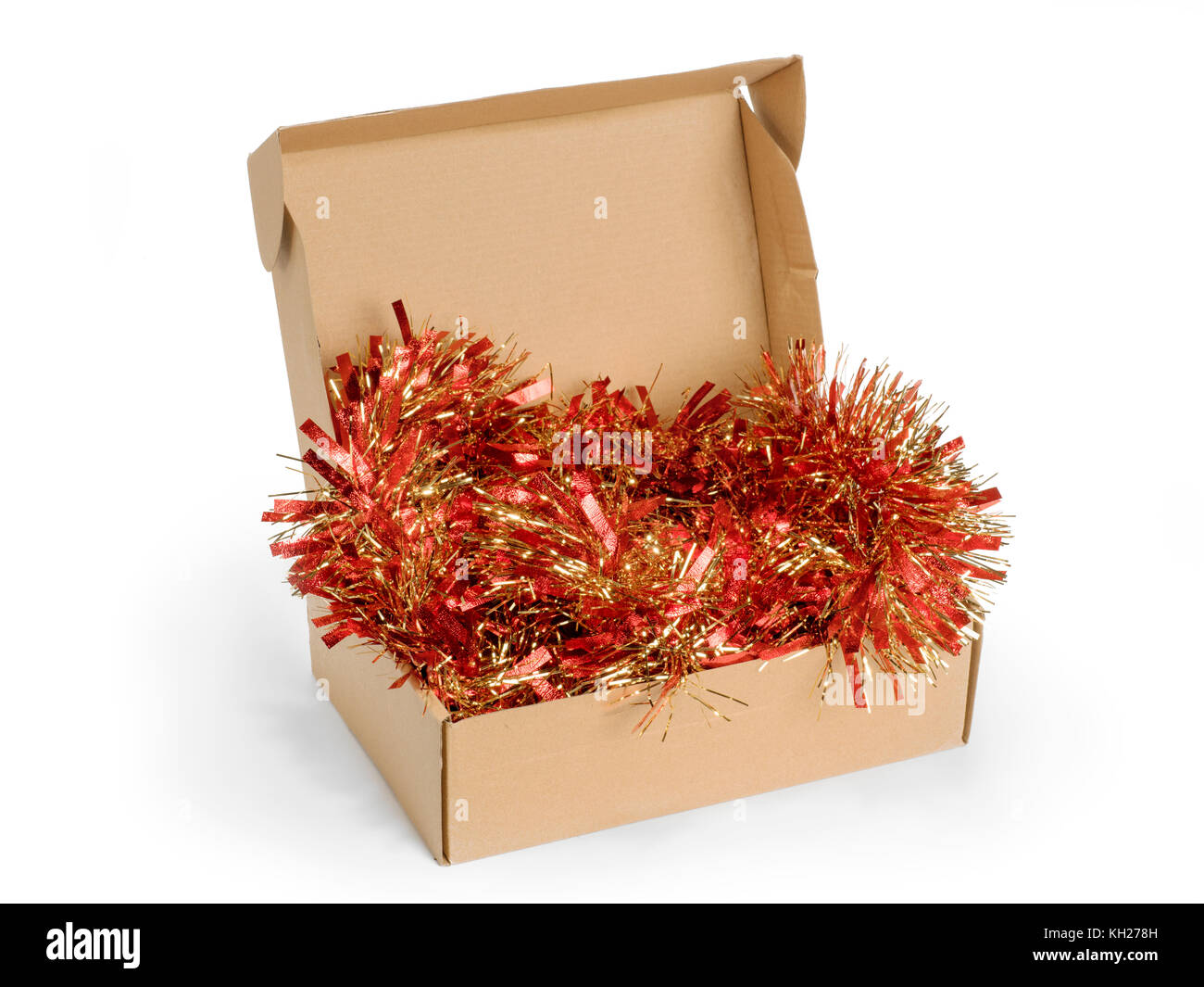 cardboard box with christmas tinsel isolated on white stock image - Cardboard Box Christmas Decorations cardboard box with christmas tinsel isolated on white stock image - Cardboard Box Christmas Decorations