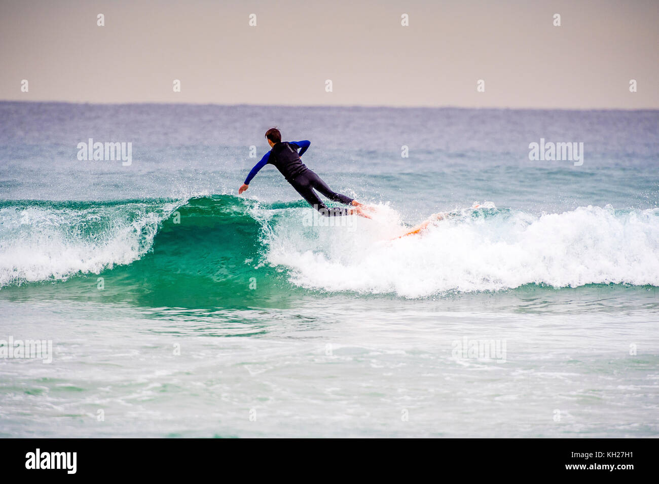 A surfer wipes out at Bondi Beach, Sydney, NSW, Australia Stock Photo