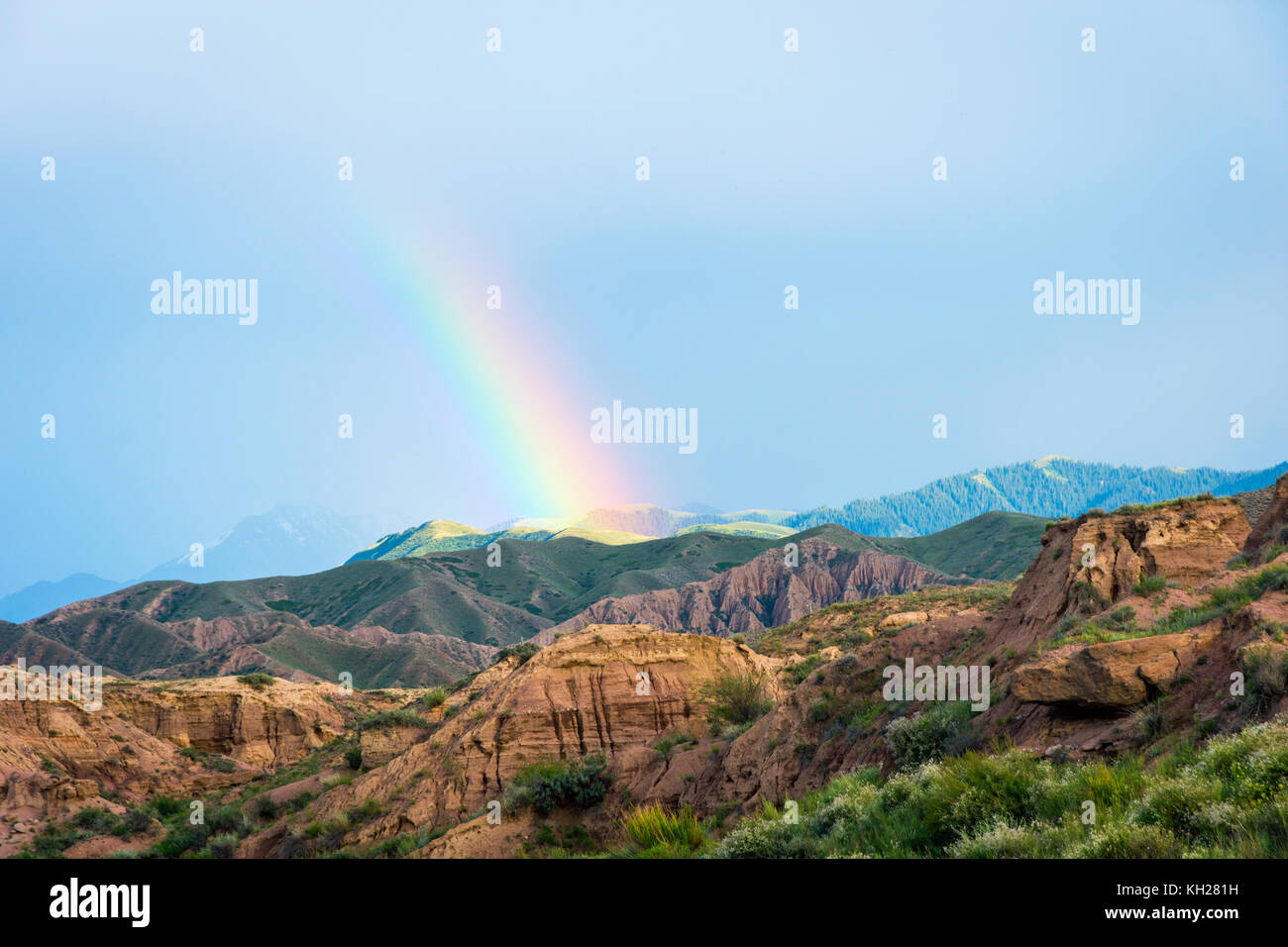 Rainbow over skazka aka fairy tale canyon, Kyrgyzstan Stock Photo