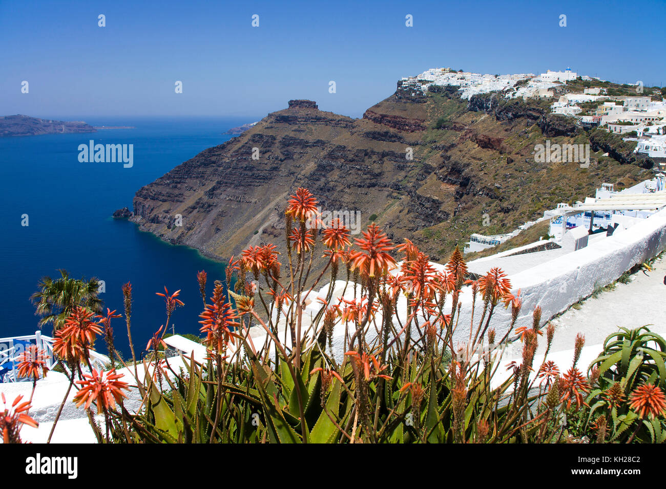View from the crater edge path at Firofestani on Caldera and the village Imerovigli with Scaros rock, Santorini, Cyclades, Greece, Mediterranean S Stock Photo