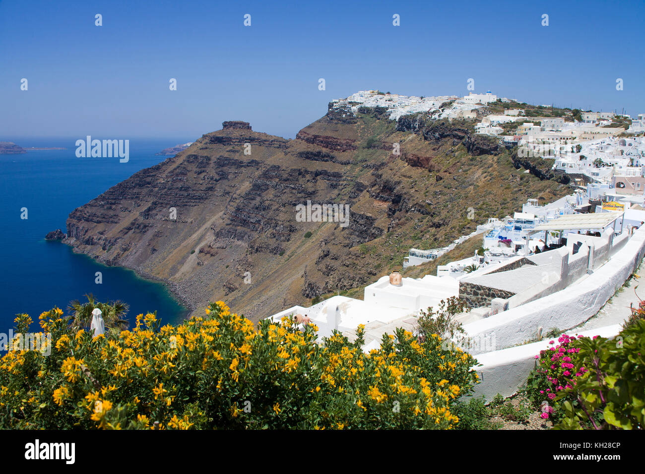 View from the crater edge path at Firofestani on Caldera and the village Imerovigli with Scaros rock, Santorini, Cyclades, Greece, Mediterranean S Stock Photo