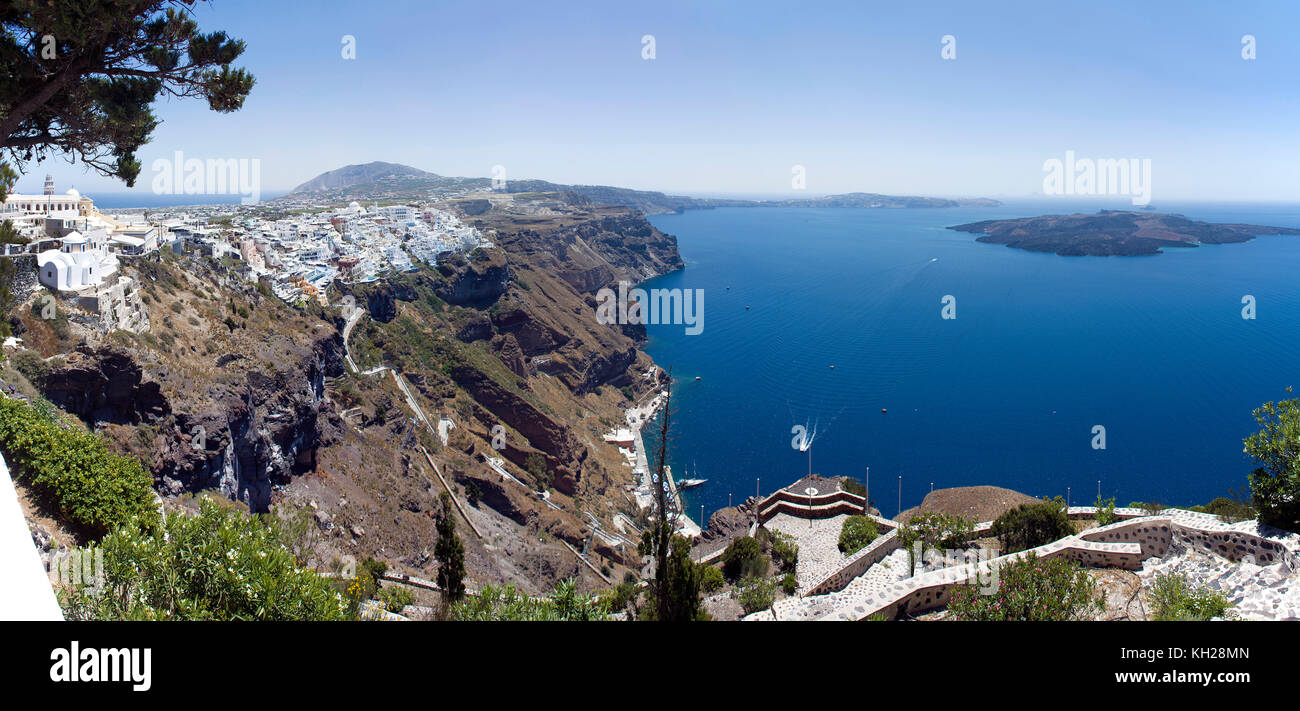 View from the crater edge path down to Thira and the old harbour, Santorin island, Cyclades, Aegean, Greece Stock Photo
