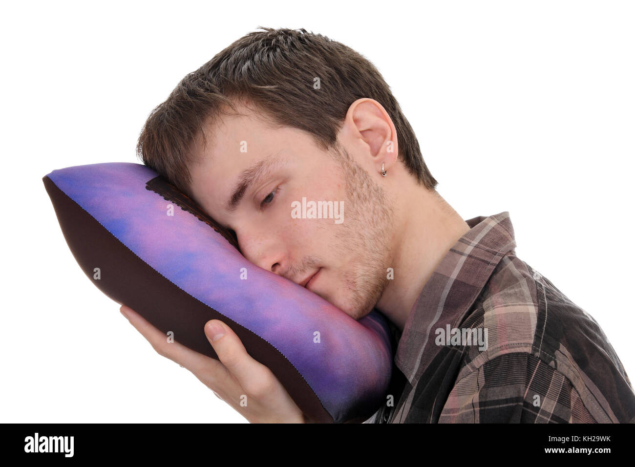 Tired student falls asleep on a pillow Stock Photo Alamy