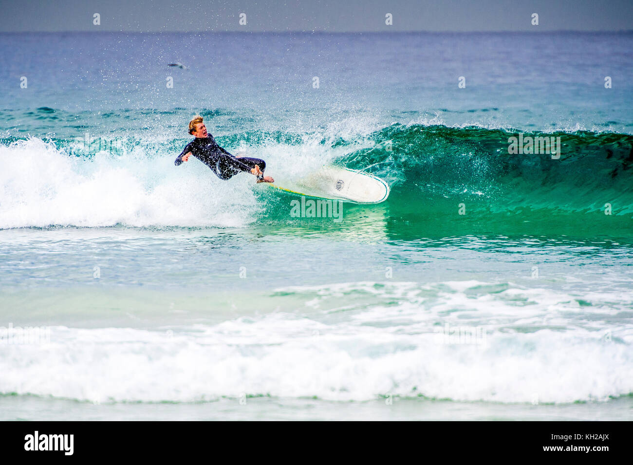 A surfer wipes out at Bondi Beach, Sydney, NSW, Australia Stock Photo