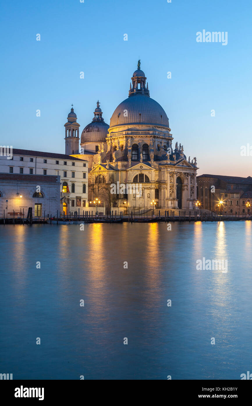 Basilica di Santa Maria della Salute and the Grand Canal at blue hour, Dorsoduro, Venice, Italy. Long exposure Stock Photo