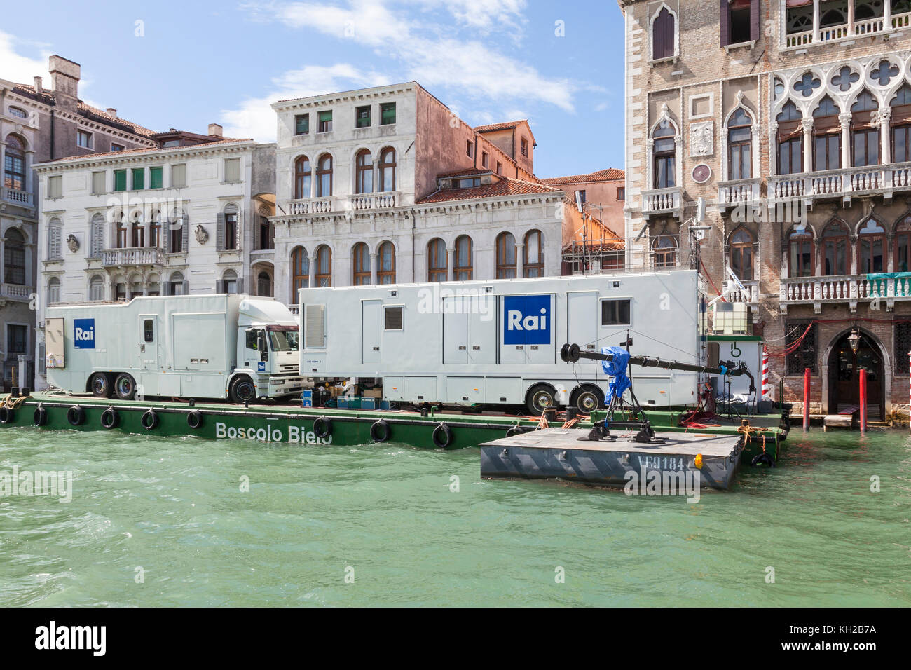 Two Italian  RAI television trucks  and equiment on floating pontoons in the Grand Canal, Venice, Italy ready for broadcasting an event Stock Photo
