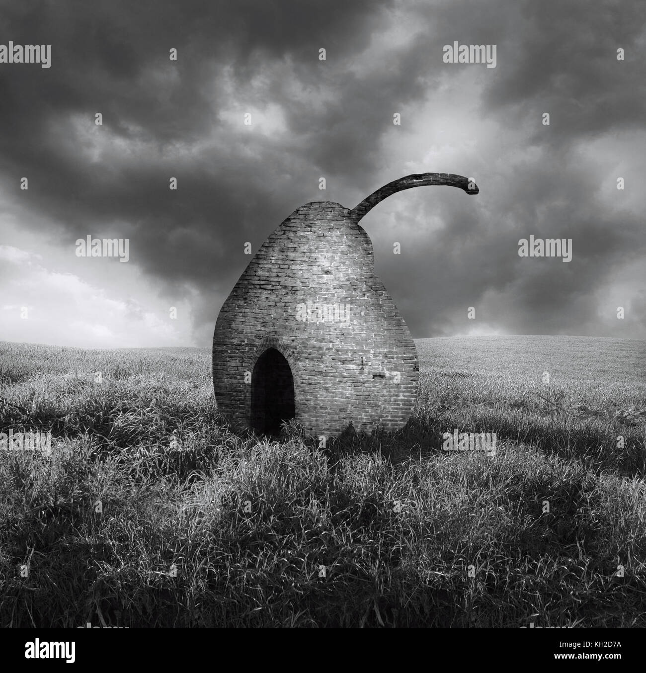 Elegant black and white surreal image representing a brick pearl isolated in a countryside landscape Stock Photo