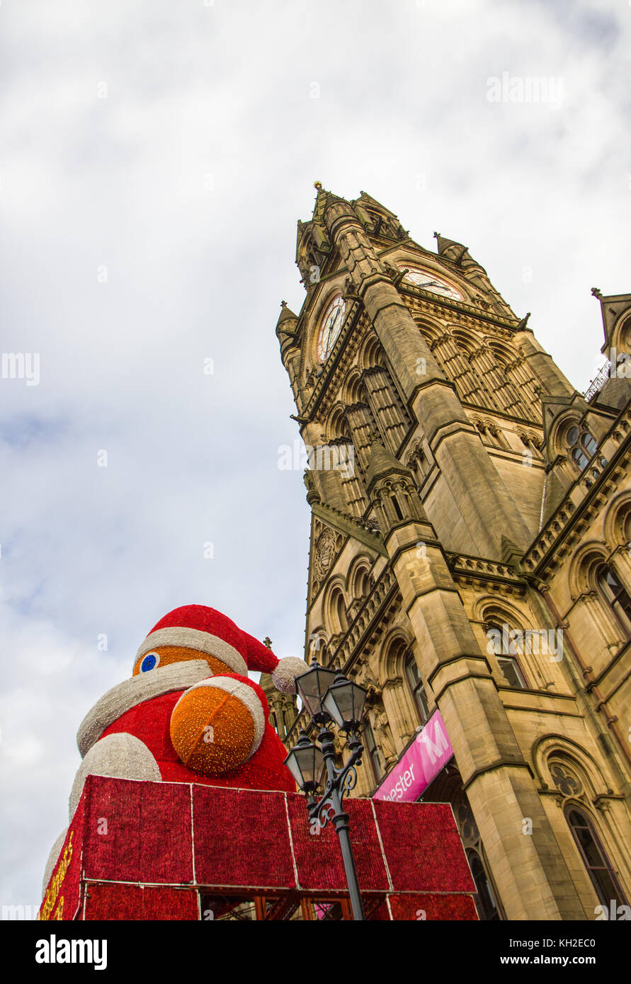Giant Santa Claus above the Entrance to Manchester Town Hall, UK. Taken on 11 Nov 2017 on the first Saturday of the Manchester Christmas markets for 2 Stock Photo