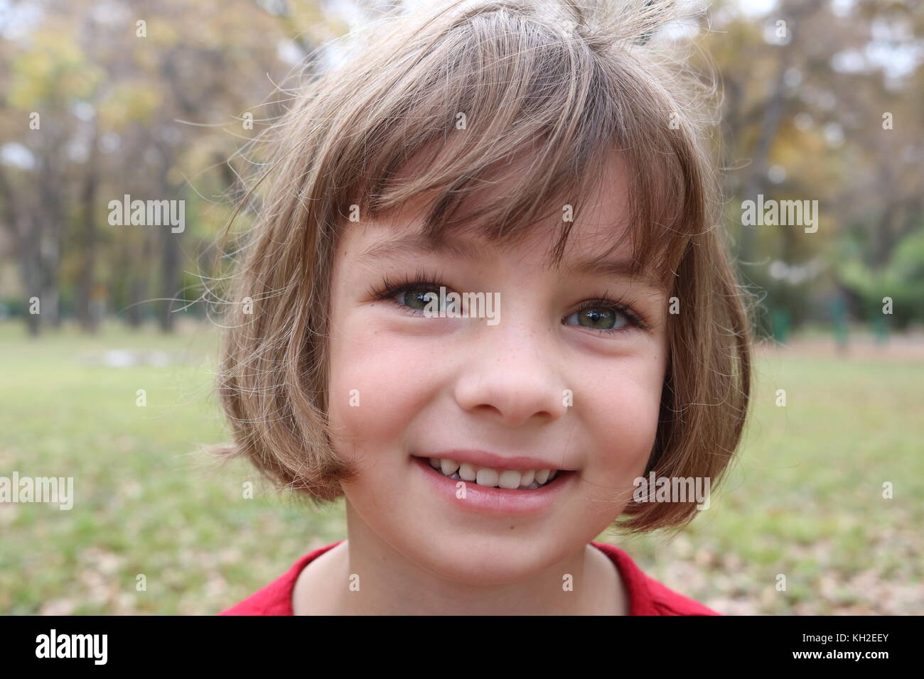 Portrait of a girl with a happy smile Stock Photo - Alamy