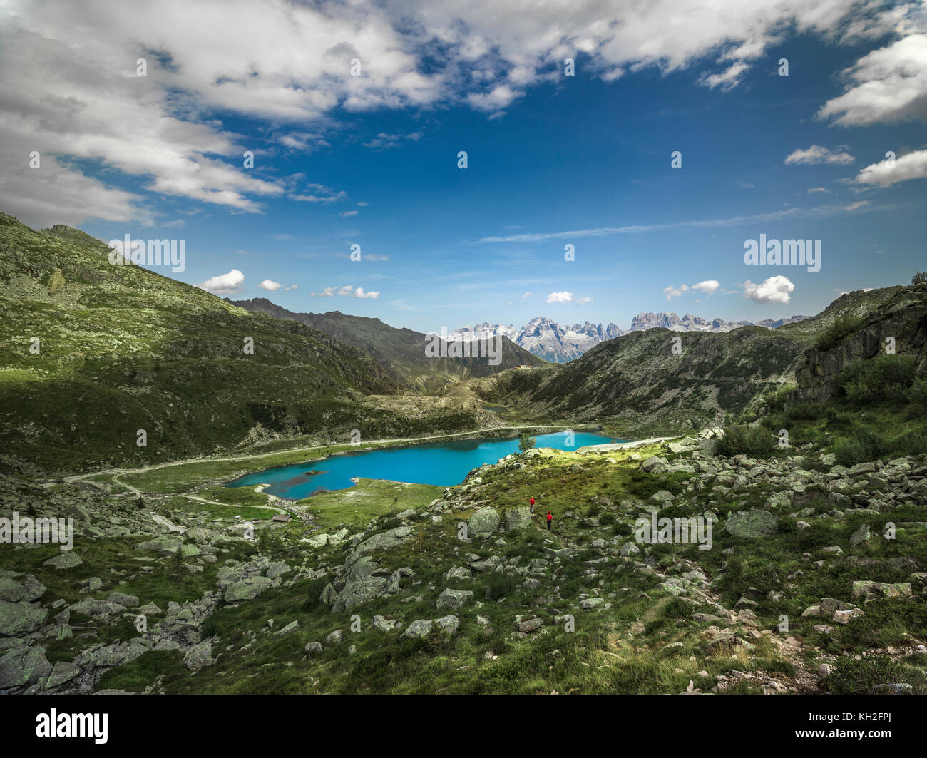 Northern Italy, mountain range, peaks, alps, cloudy weather, blue sky, mountain slopes, scenic landscape, European mountains Stock Photo