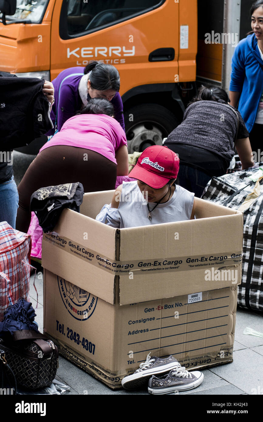Hong Kong Filipino overseas workers prepare balikbayan boxes in Central