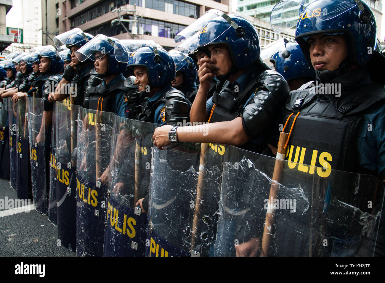 Police During Rally Philippines. 12th Nov, 2017. Crowd control police officers hold the ...