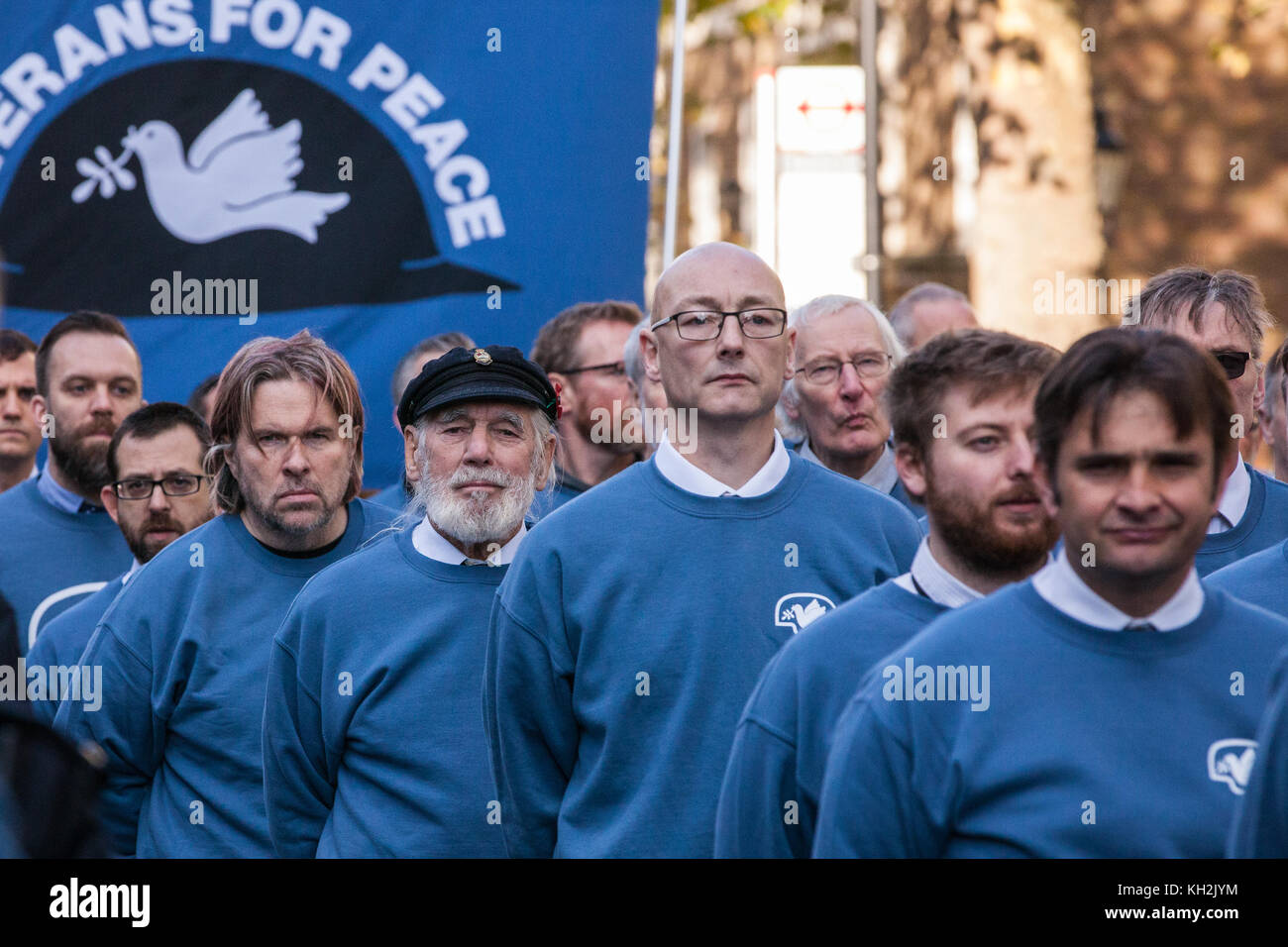 London, UK. 12th November, 2017. Jim Radford (c), D-Day veteran, folk singer and peace campaigner, prepares to walk to the Cenotaph with ex-services men and women from Veterans For Peace UK (VFP UK) on Remembrance Sunday. VFP UK was founded in 2011 and works to influence the foreign and defence policy of the UK for the larger purpose of world peace. Credit: Mark Kerrison/Alamy Live News Stock Photo