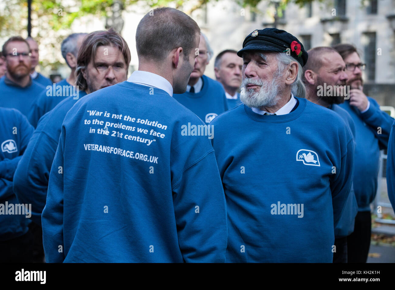 London, UK. 12th November, 2017. Ben Griffin, ex-SAS soldier and coordinator of Veterans For Peace UK, speaks to Jim Radford (r), D-Day veteran, folk singer and peace campaigner, before ex-services men and women from Veterans For Peace UK walk to the Cenotaph on Remembrance Sunday. VFP UK was founded in 2011 and works to influence the foreign and defence policy of the UK for the larger purpose of world peace. Credit: Mark Kerrison/Alamy Live News Stock Photo