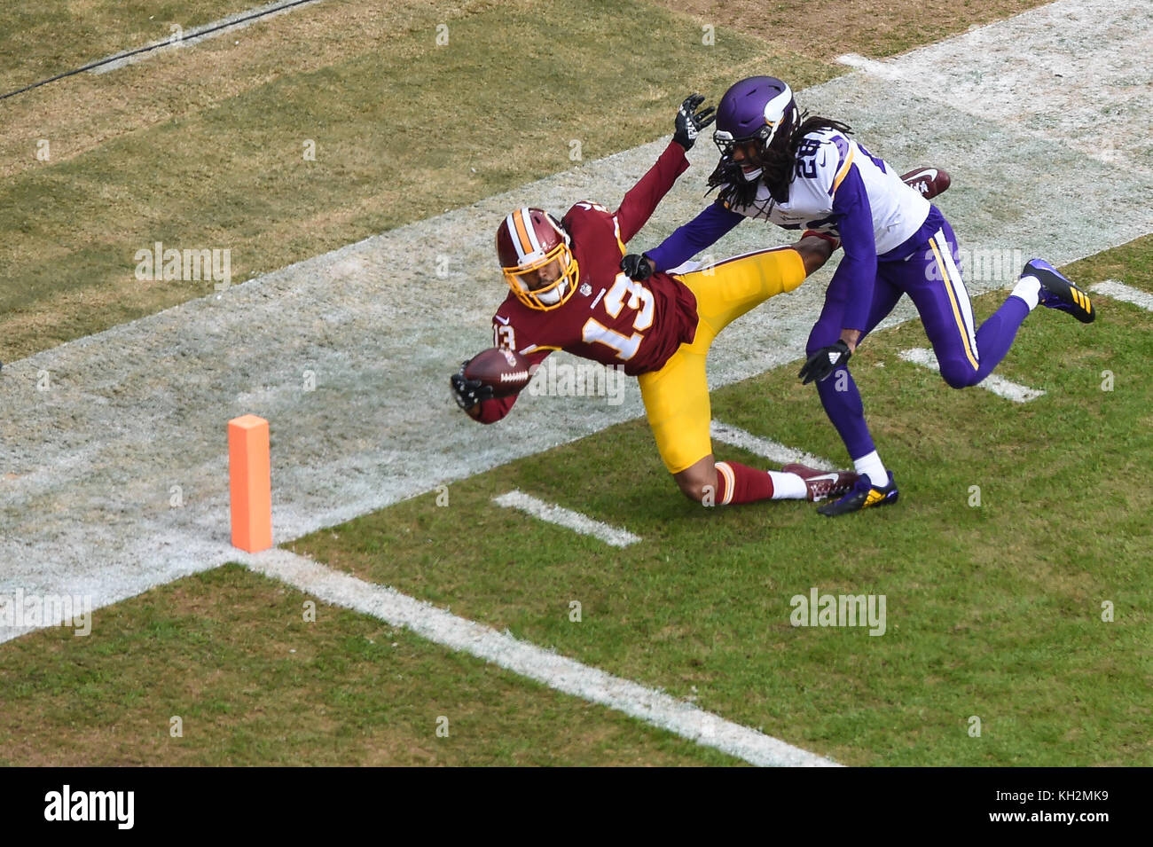 Landover, MD, USA. 12th Nov, 2017. Washington Redskin wide receiver Maurice Harris (13) catches a touchdown pass in the first quarter while Minnesota Vikings cornerback Trae Waynes (26) defends during the matchup between the Minnesota Vikings and the Washington Redskins at FedEx Field in Landover, MD. Credit: csm/Alamy Live News Stock Photo