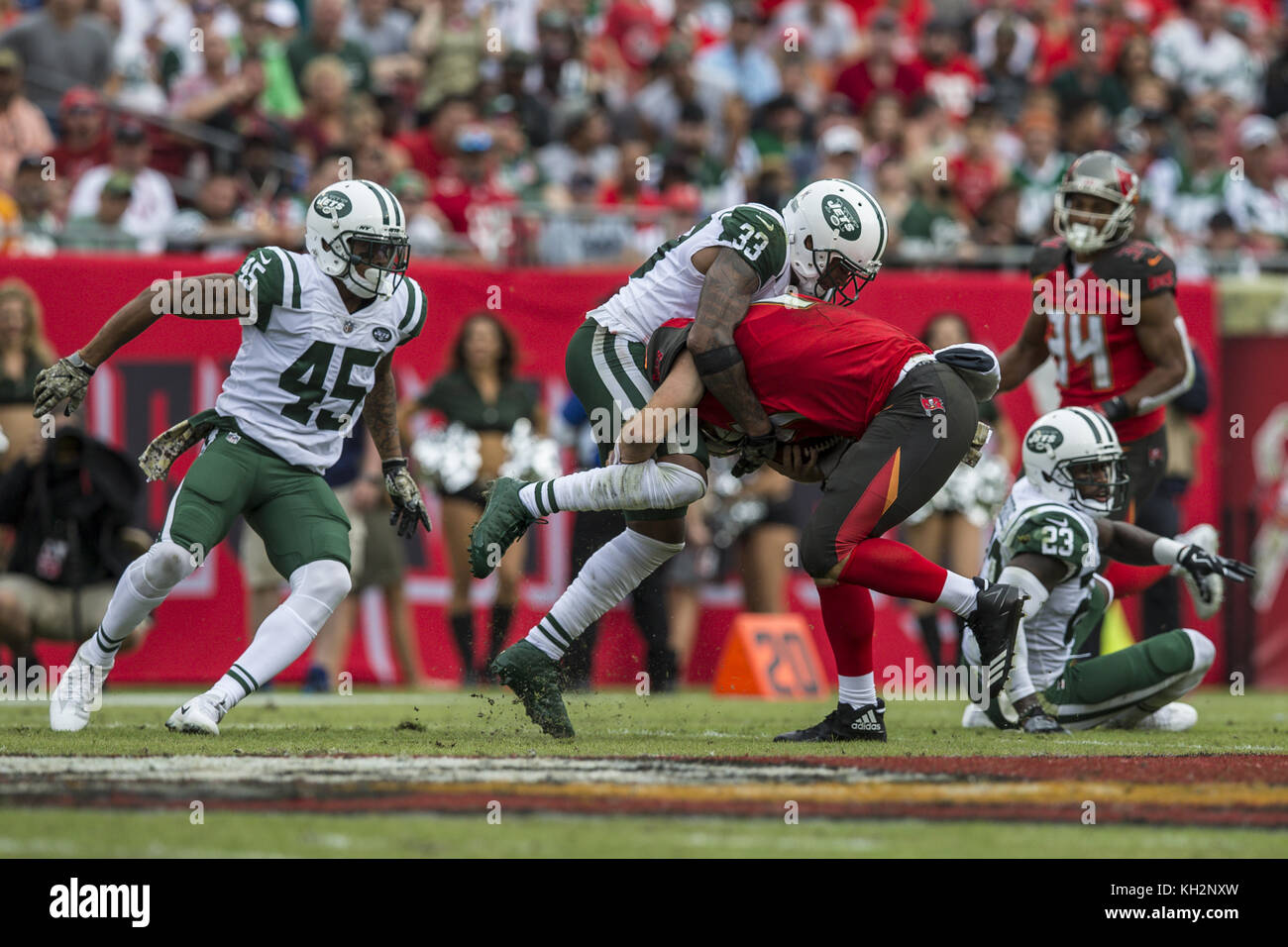 Tampa, Florida, USA. 31st Aug, 2017. New York Jets strong safety Jamal Adams (33) brings down Tampa Bay Buccaneers quarterback Ryan Fitzpatrick (14) during the game on Sunday November 12, 2017 at Raymond James Stadium in Tampa, Florida. Credit: Travis Pendergrass/ZUMA Wire/Alamy Live News Stock Photo