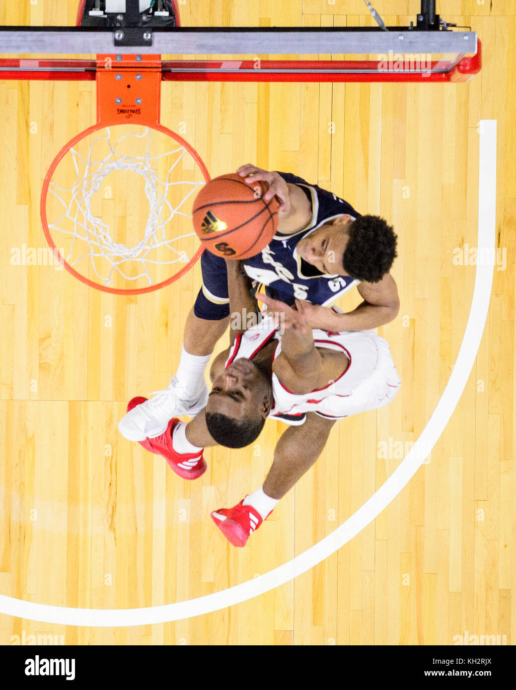 Charleston Southern guard Deontaye Buskey (4) and NC State guard ...