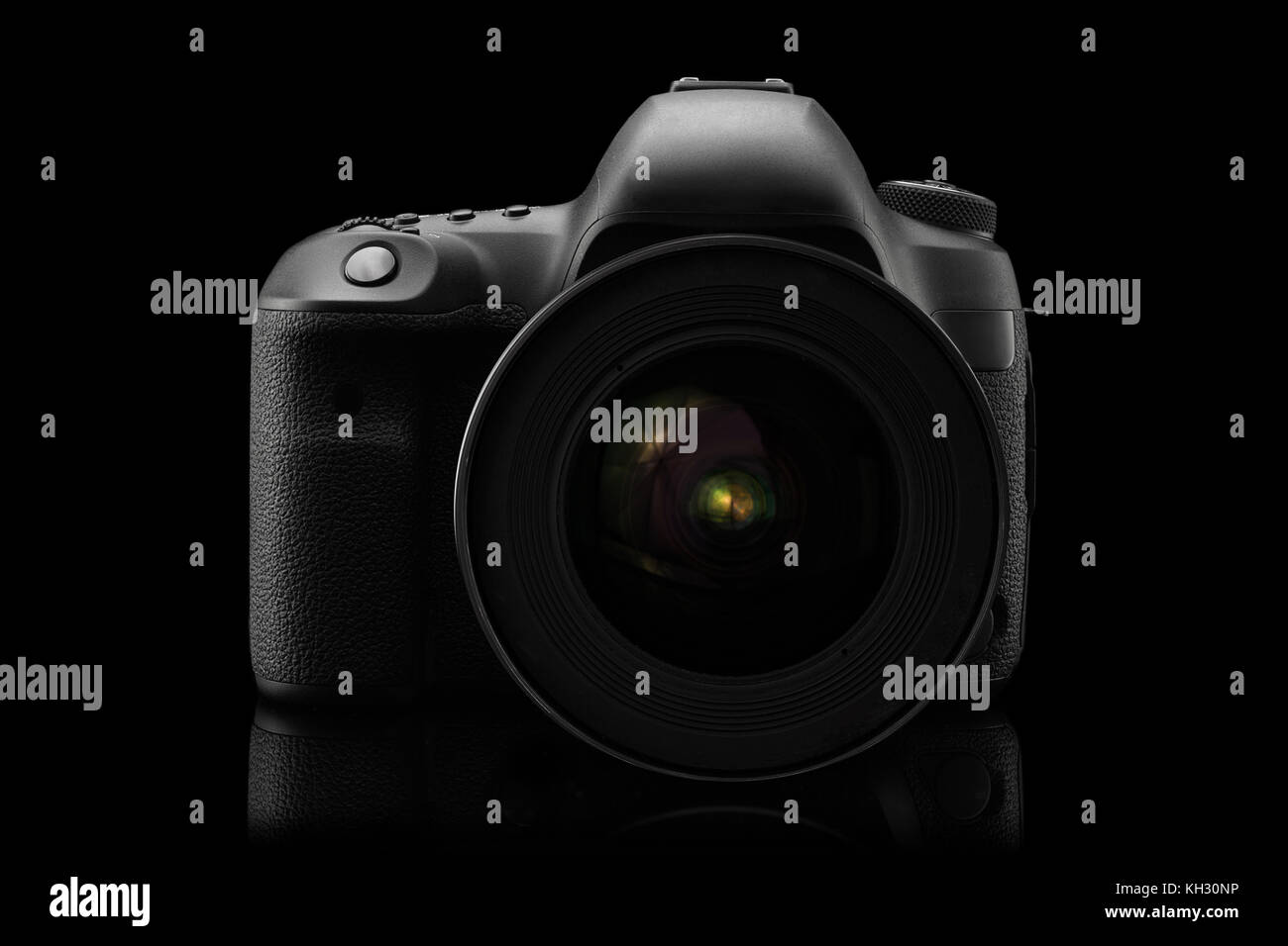 Isolated SLR camera on a black background Stock Photo