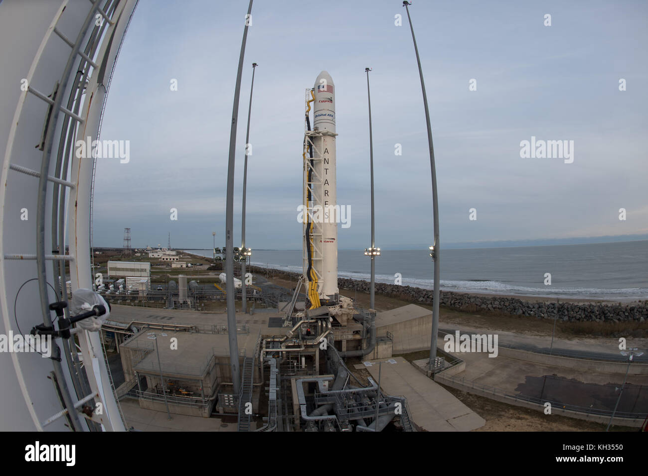 The Orbital ATK Antares rocket carrying the Cygnus space capsule is readied for launch Pad-0A at Wallops Flight Facility November 11, 2017 in Wattsville, Virginia. The rocket was delayed after an aircraft entered the restricted airspace delaying the launch by a day. Stock Photo