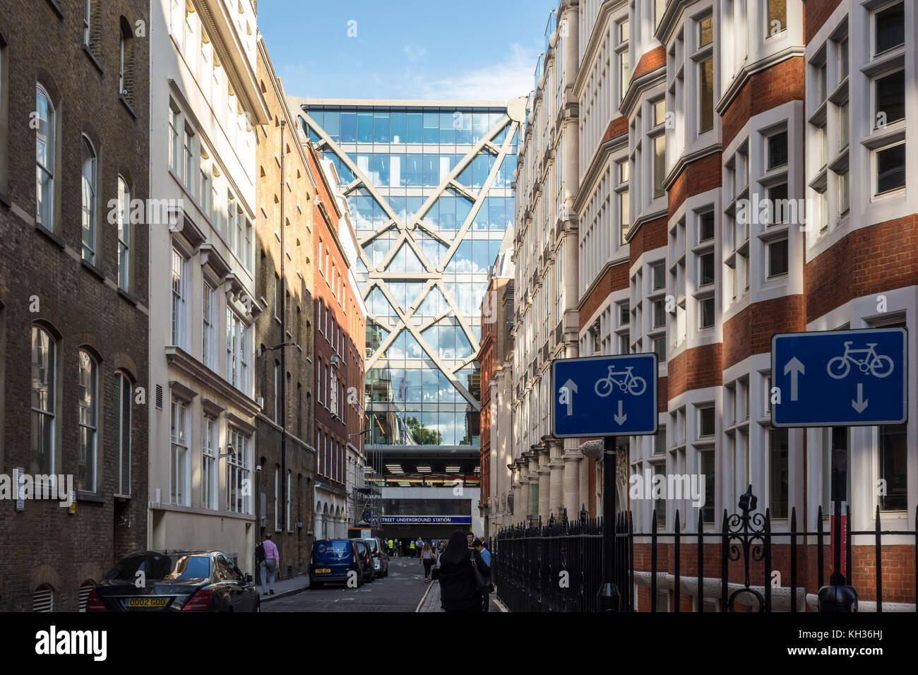 View of Cannon Street Station along Cloak Lane, City of London, UK, with cycle lane signs Stock Photo