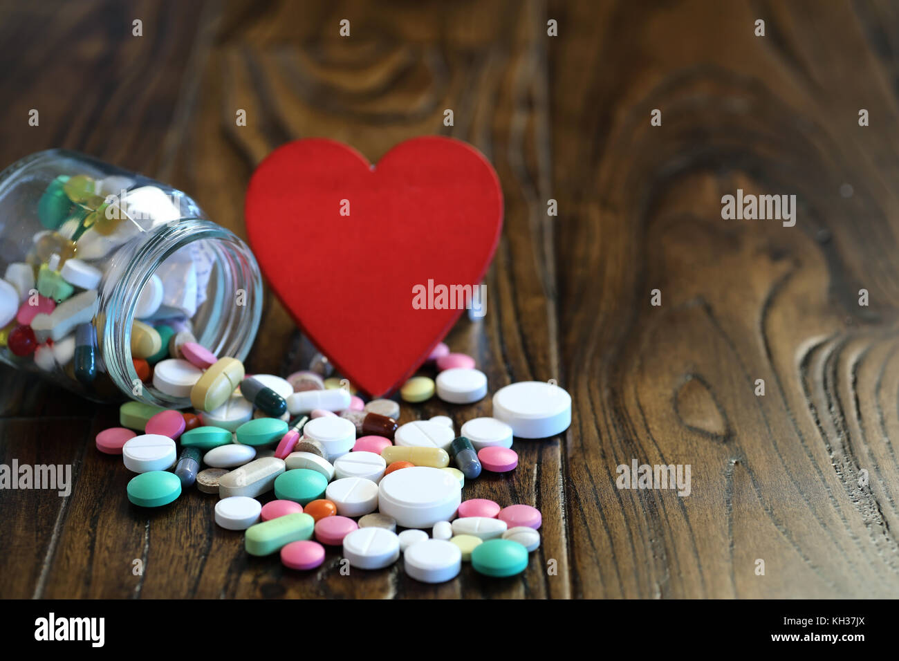 Multicolored tablets of different shapes and sizes Stock Photo