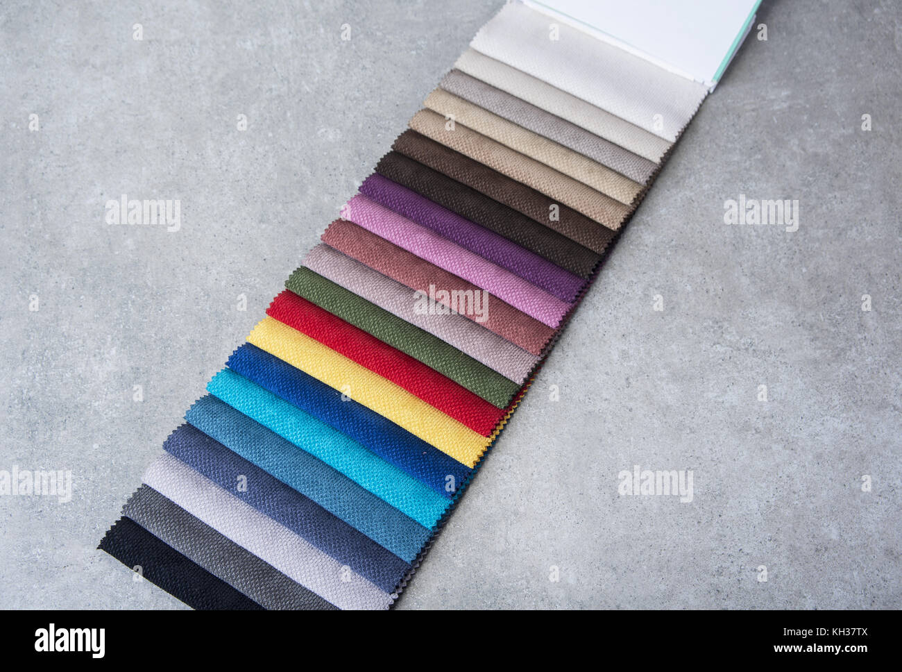 Colorful upholstery fabric samples in the store Stock Photo - Alamy