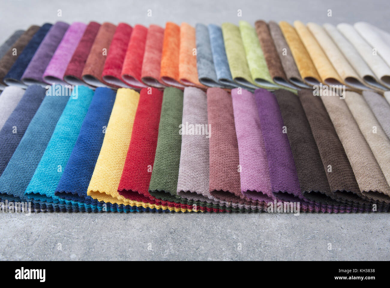 Colorful upholstery fabric samples in the store Stock Photo