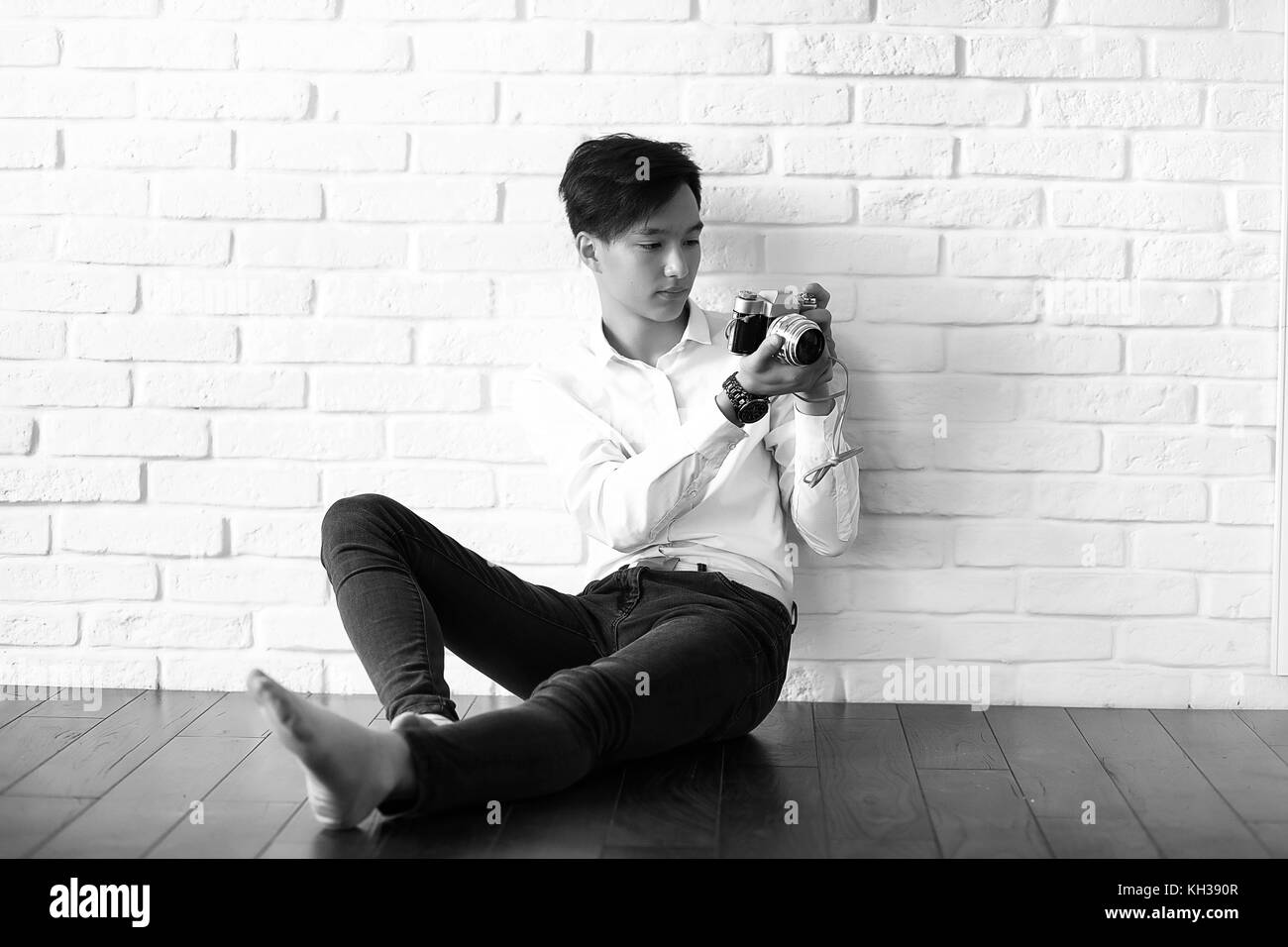 Asian Man With A Camera Black And White Stock Photo Alamy