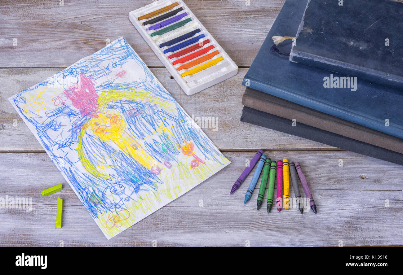 Child painting in the preschool with crayons Stock Photo - Alamy