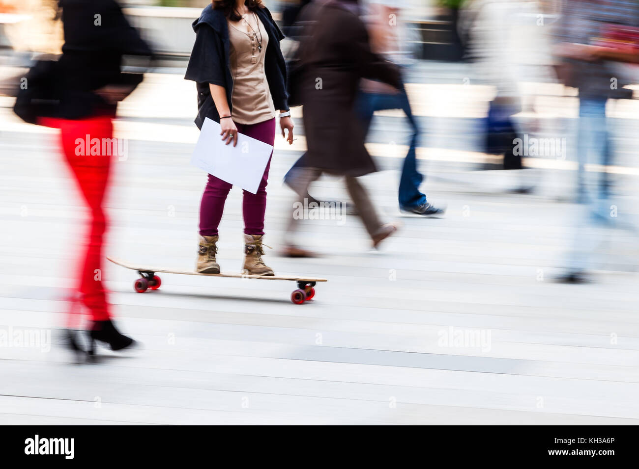 people walking in the city with camera made motion blur effect Stock ...