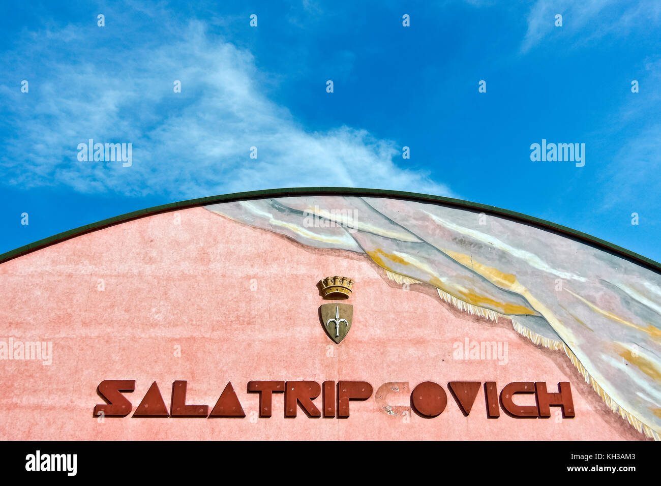 Theatre Sala Tripcovich, front view. Formerly coach station. Trieste, Friuli Venezia Giulia, Italy, Europe. Off the beaten track. Blue sky, copy space Stock Photo