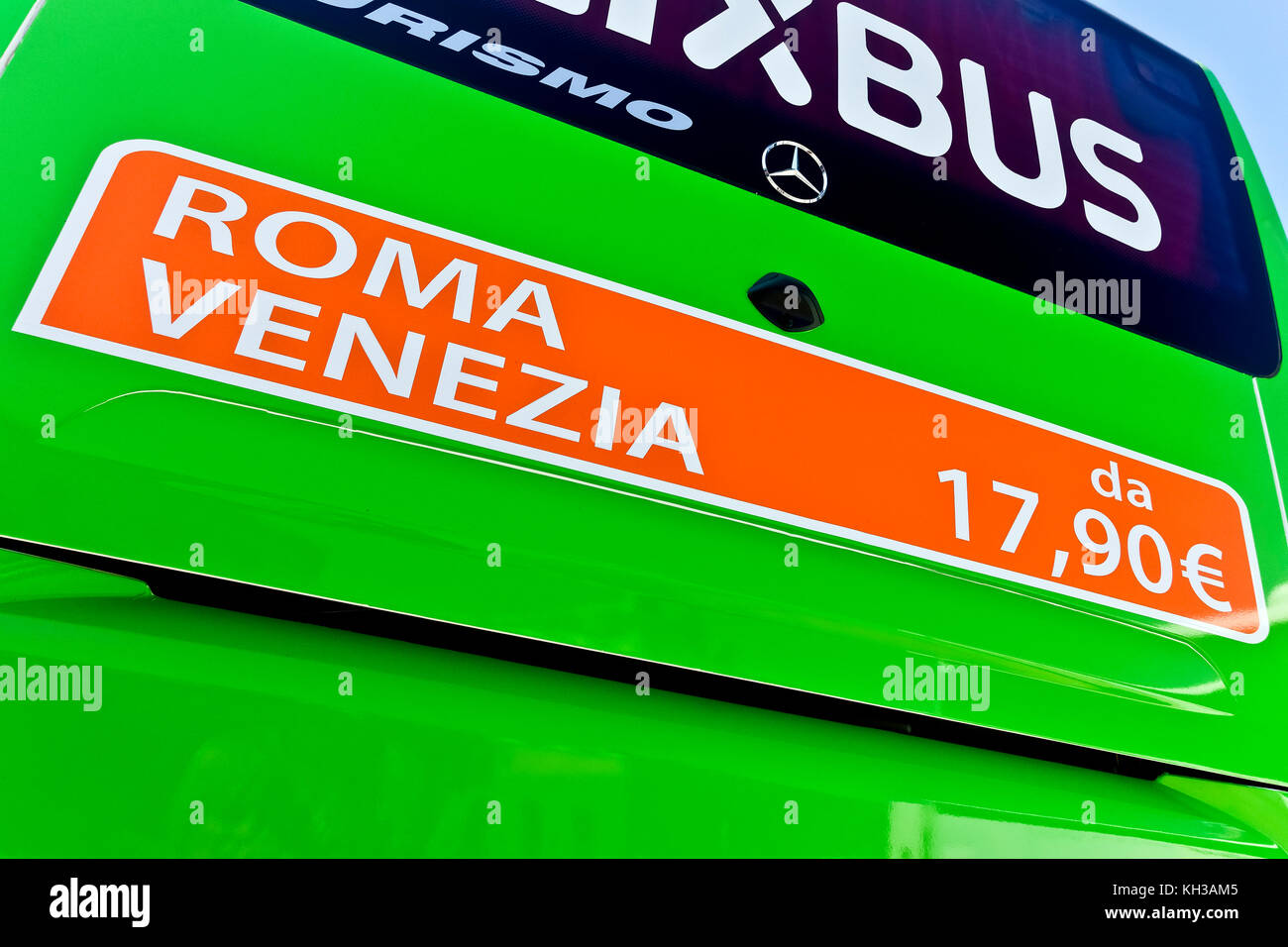 Low-cost bus transportation. Advertisement on rear FlixBus coach advertising low fare from Rome to Venice. Intercity bus service in Europe. Stock Photo
