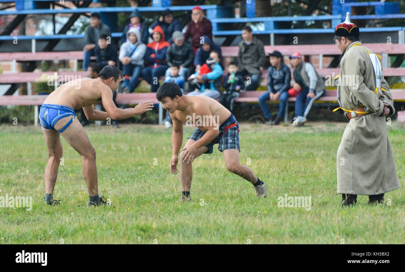 IVOLGINSKY REGION, BURYATIA - SEPTEMBER 9, 2013. Three Games of a Man - Eleventh Annual Wrestling event in Ulan-Ude. Traditional Mongolian-style wrest Stock Photo