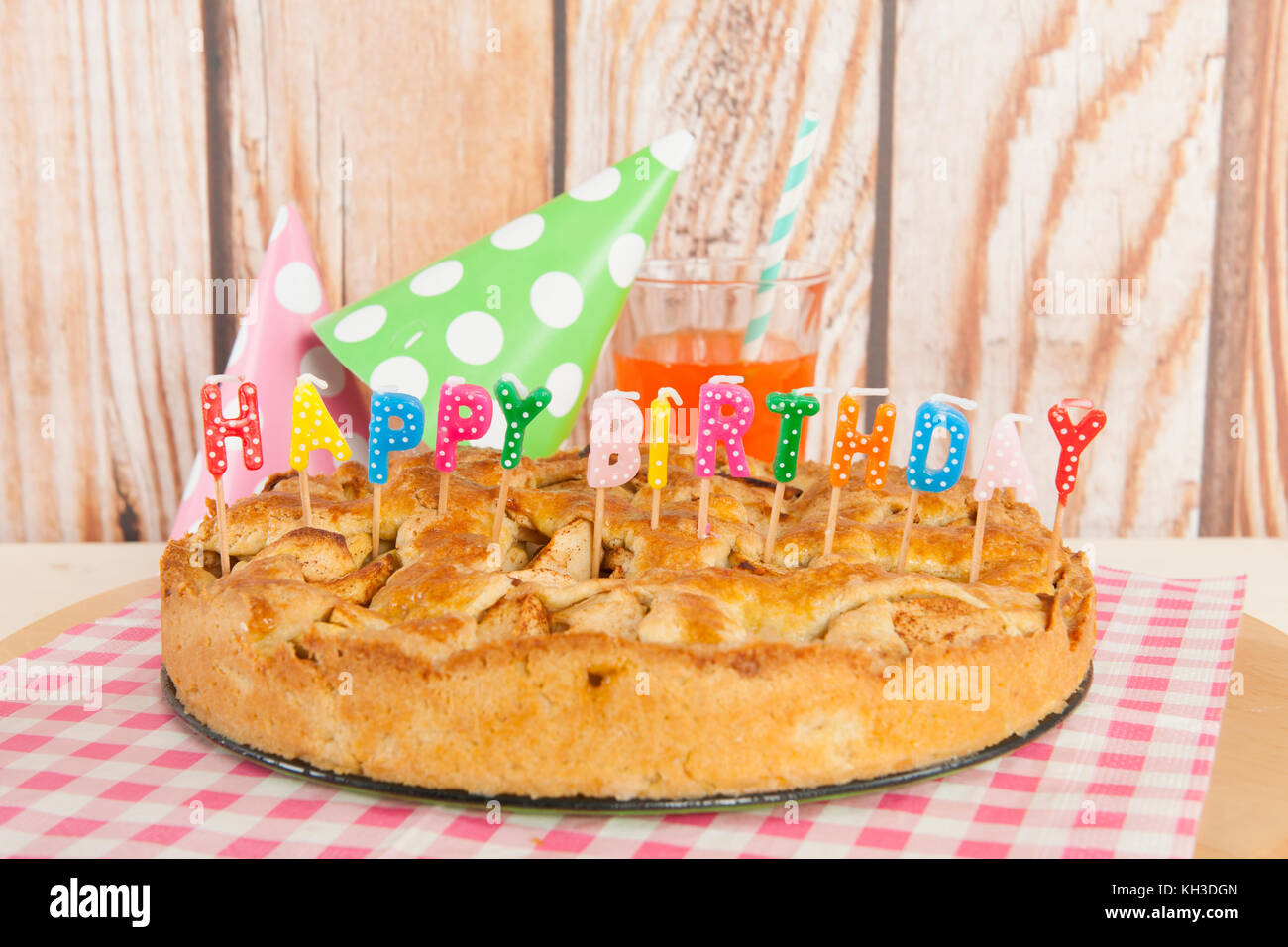 Home made apple pie with birthday candles Stock Photo - Alamy