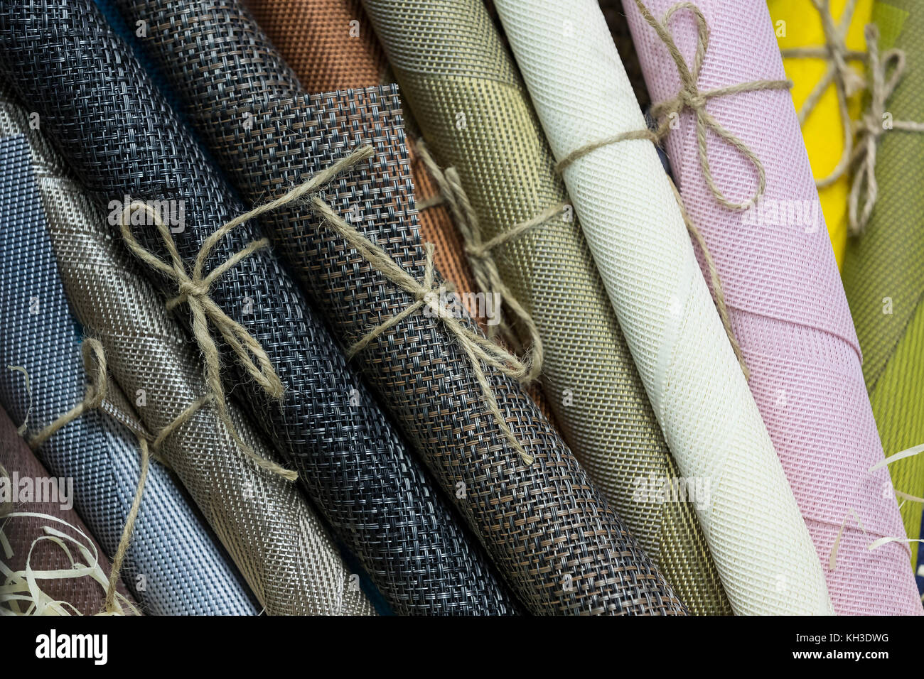 Rolls of wrapping paper binding with rope Stock Photo Alamy